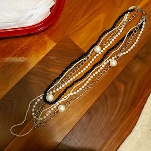 Multi strand black and white faux pearl necklace